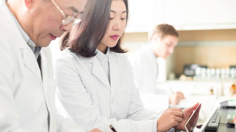 researchers in a conference room